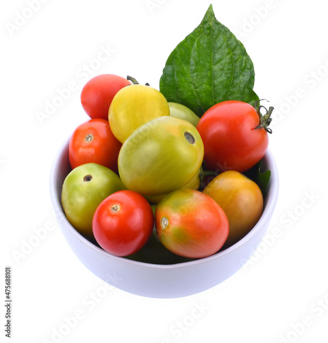 Cherry tomatoes stack isolated on white background