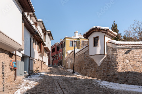 Snow on street of Old Town in Plovdiv, Bulgaria on winter, clear sunny day.