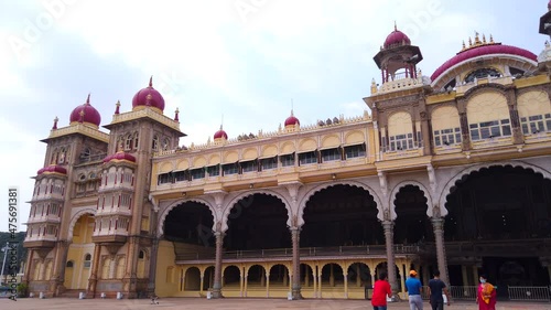 MYSORE, INDIA - Nov 24, 2020: The Mysore Palace surrounded by a garden in Mysore, India shot in 4K photo