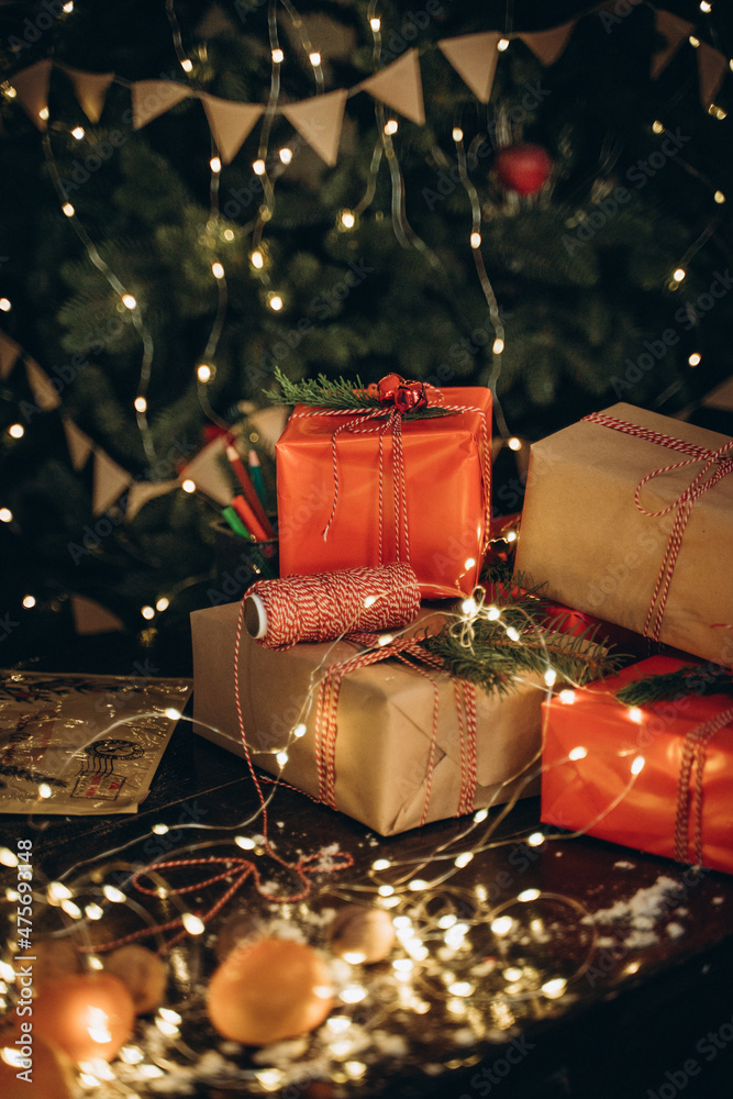 Packed New Year's gifts near the Christmas tree Packed New Year's gifts near the Christmas tree