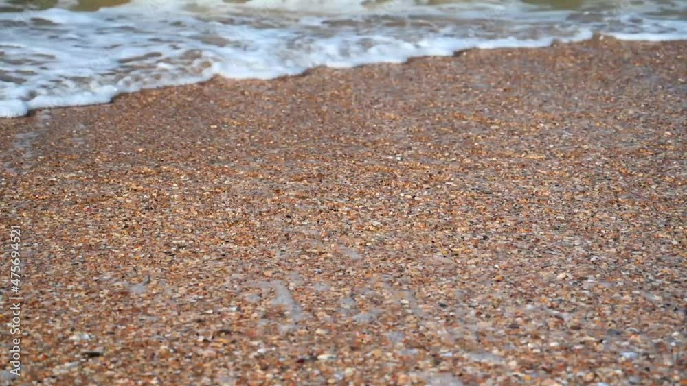 Coastline against the blue sea with yellow sand Coastline against the blue sea with yellow sand