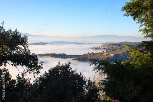 Town s overview through the fog  R  gua  Portugal 