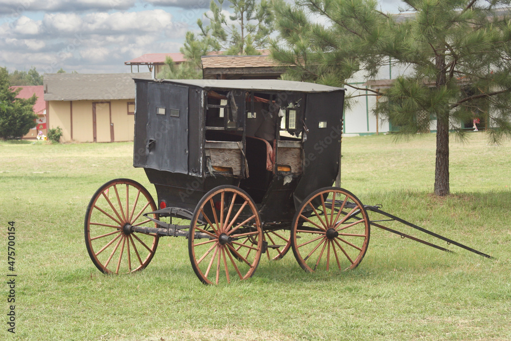 Old Broken Antique Horse Carriage in old western town
