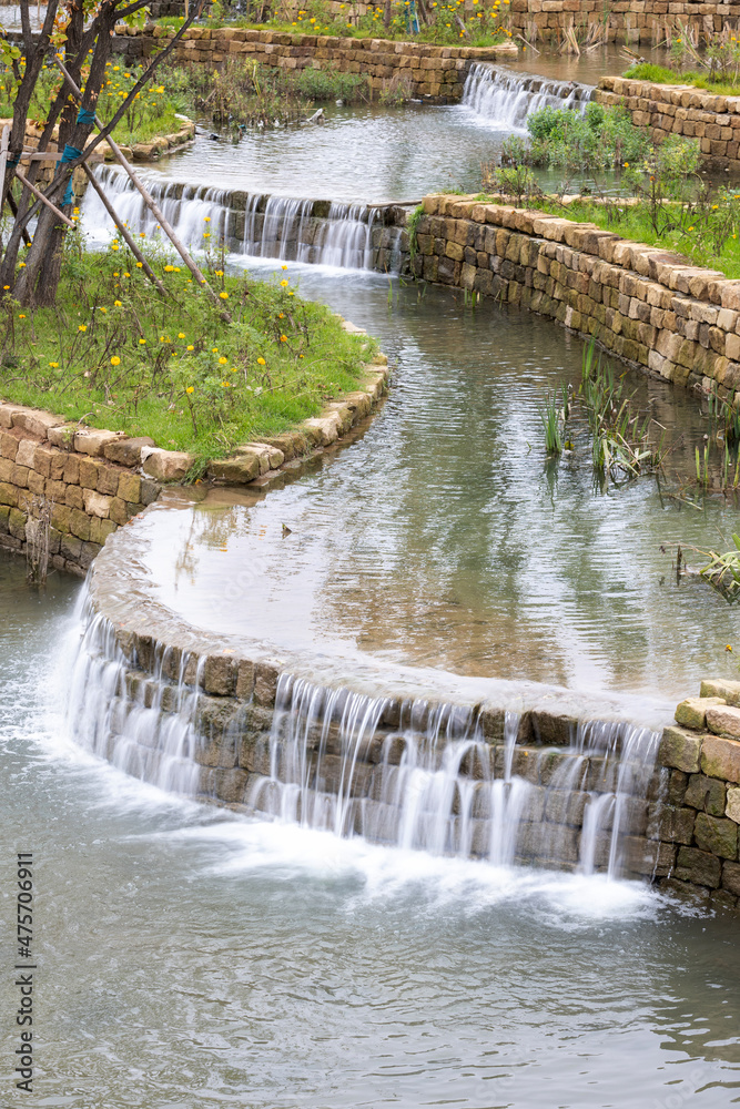 Naklejka premium The stream trickled down from a high place