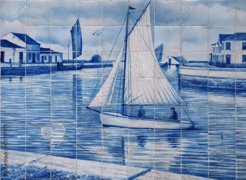 Tiles or Azulejos form a historic motive on the outide facade of Aveiro railway station in Portugal