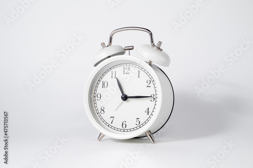 Horizontal photo of white vintage watch on white isolated background, business