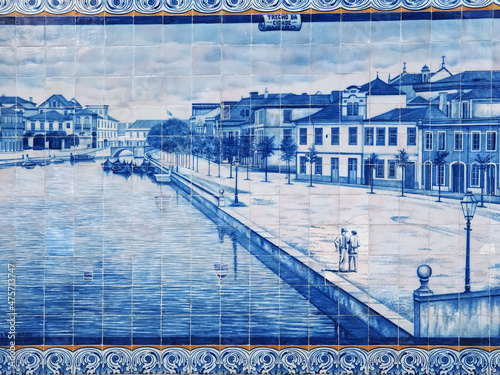 Tiles or Azulejos form a historic motive on the outide facade of Aveiro railway station in Portugal