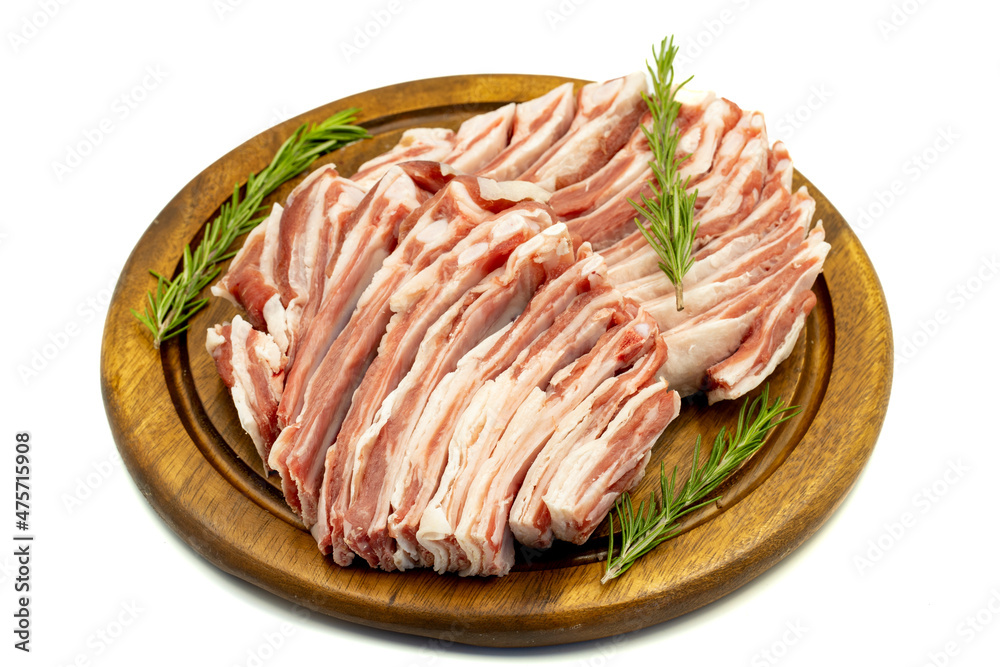 Raw lamb ribs isolated on white background. close-up lamb ribs. Horizontal view. Raw lamb ribs isolated on white background. close-up lamb ribs. Horizontal view.