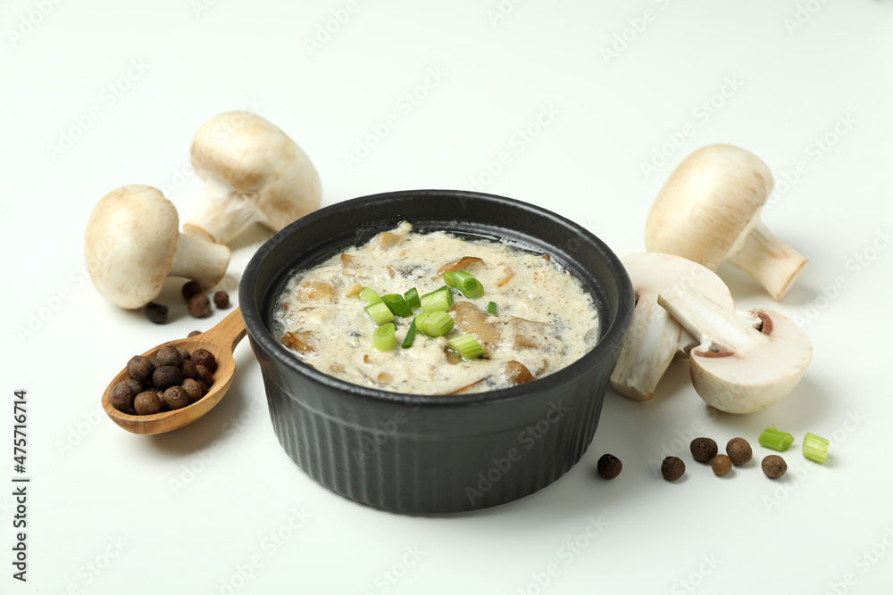 Concept of tasty food with mushroom sauce on white background Concept of tasty food with mushroom sauce on white background