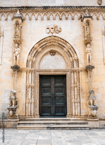 The northern portal of the St. James cathedral in Sibenik city. The St. James cathedral is one of main sights of Shibenik. The portal is called the Lion Gate. photo