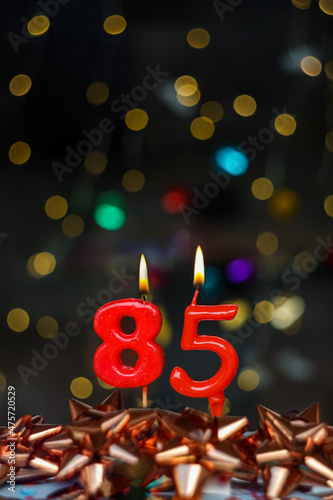 Number 85 Joyful greeting card for birthdays or anniversaries. This image is part of a serie of photos of different numbers burning candles that goes from 1 to 100