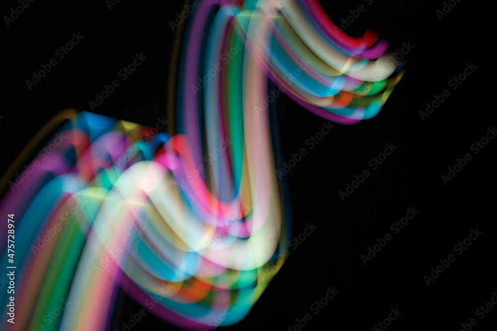 Colored blurred light lines. Abstraction of light. Colored blurred light lines. Abstraction of light.