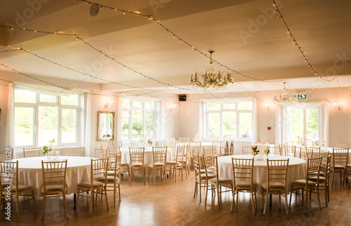 Reception and interiors of a beautiful British wedding in Romsey, Hampshire, UK.