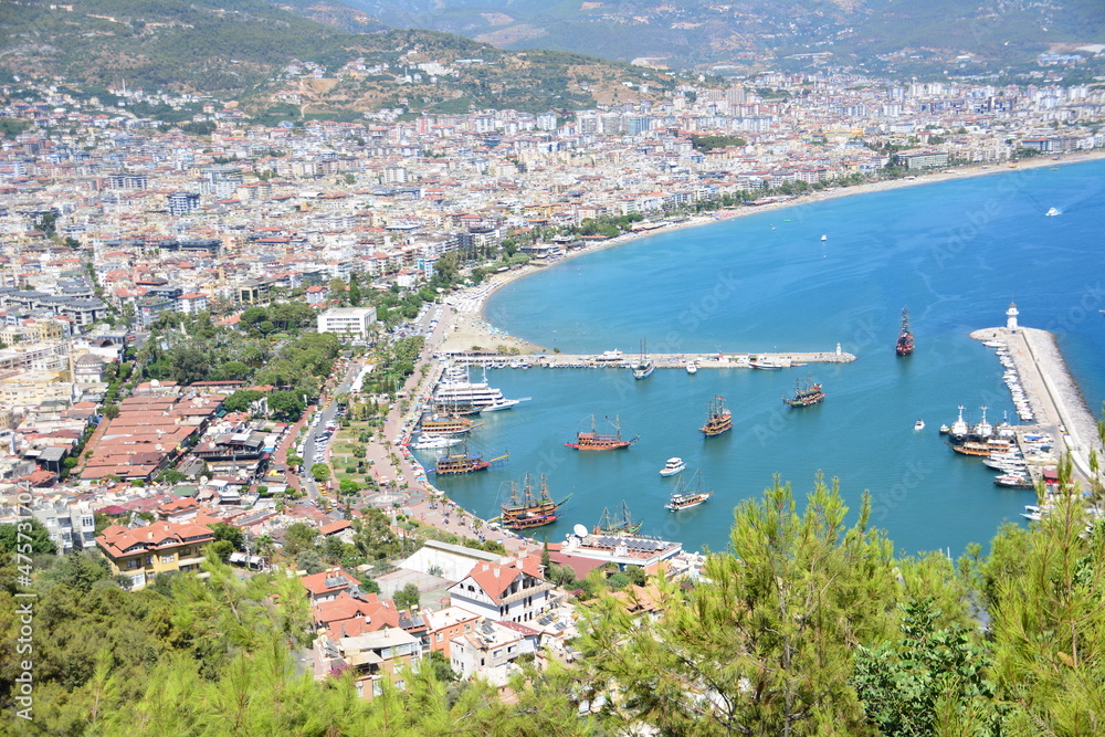 alanya harbour with sea port and lighthouse, view from the top of mountain