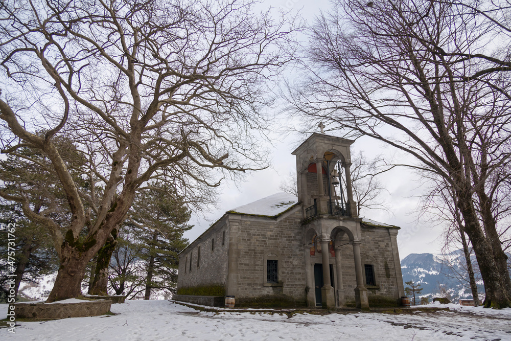 Church covered with snow in Metsovo