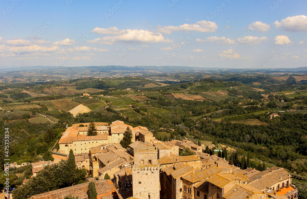 Panoramic view over the enveloping Tuscan countryside, from the tower in San Gimignano, Italy.