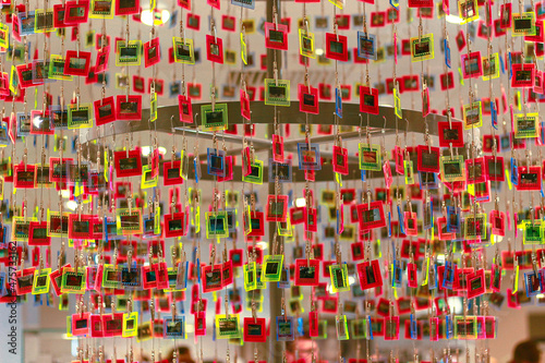 Colourful  patterned display of hanging key-rings 