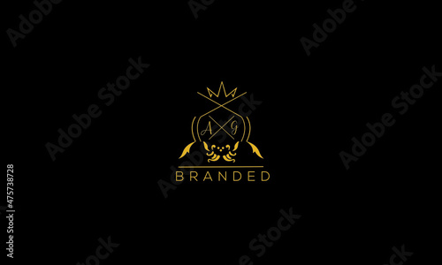 AG is a branded luxury logo with golden color and black background.