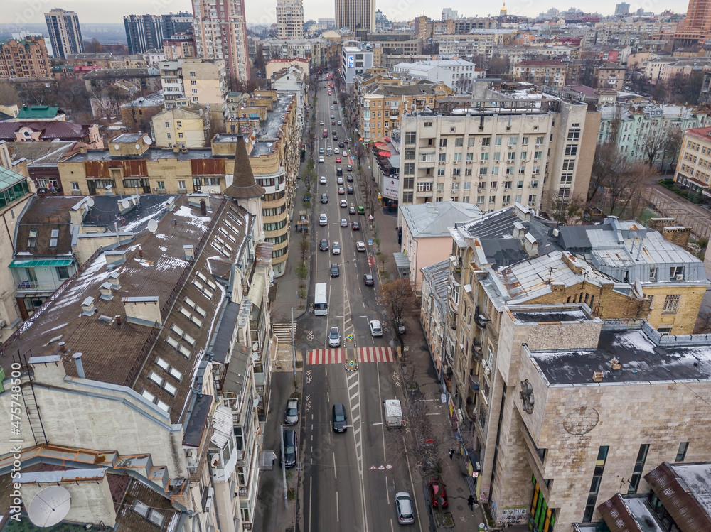 Fototapeta premium City street in Kiev in cloudy weather. Aerial drone view.