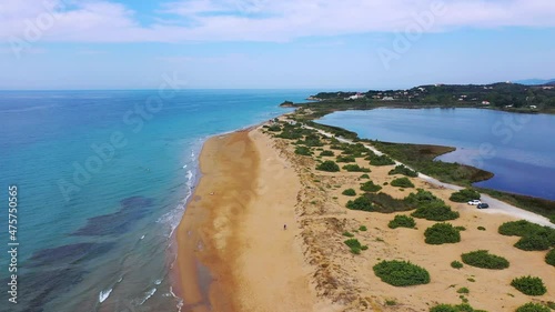 Aerial drone view of Halikounas Beach and Lake Korission, Corfu island, Ionian Sea, Greece. Halikounas Beach, Corfu Island. View of the deserted, sandy, windy beach on the western part of Corfu. photo