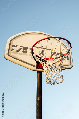 Basketball Hoop With Blue Sky In Background, Dusk © Miguel Lifestyle
