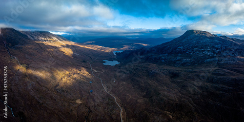 an aerial view of the torridon mountains near liathach, beinn eighe and sgurr dubh in the north west highlands of scotland during winter