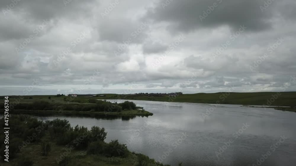 Drone flying over a body of water in Iceland Drone flying over a body of water in Iceland