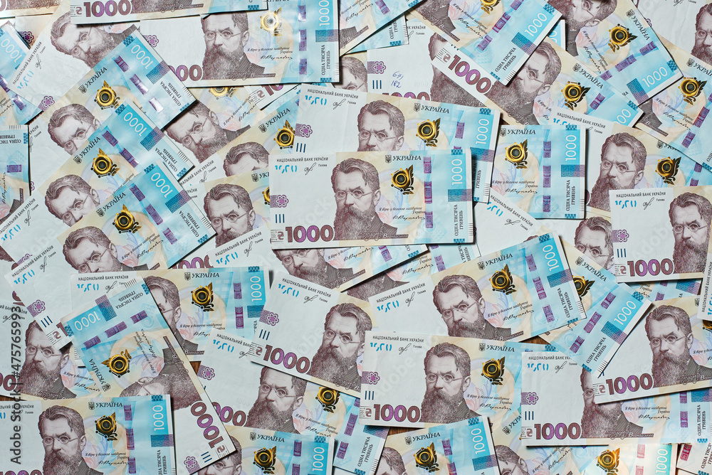 Background from Ukrainian money. Ukrainian 1000. Banknotes of Ukraine. Banner made of bills.