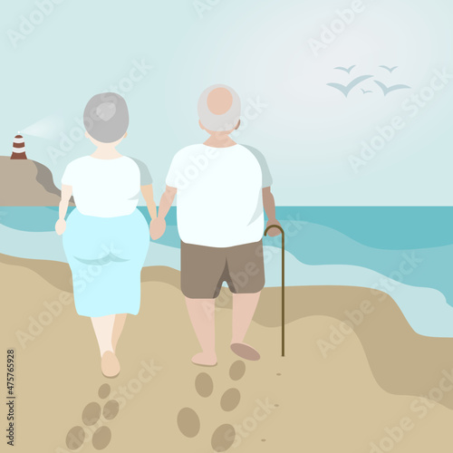 Elderly couple walking by the beach