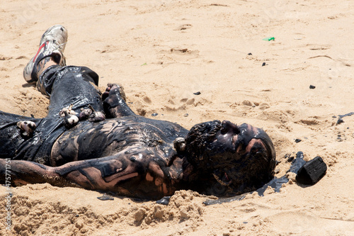 Man performs theatrical performance of Garlic and Oil photo