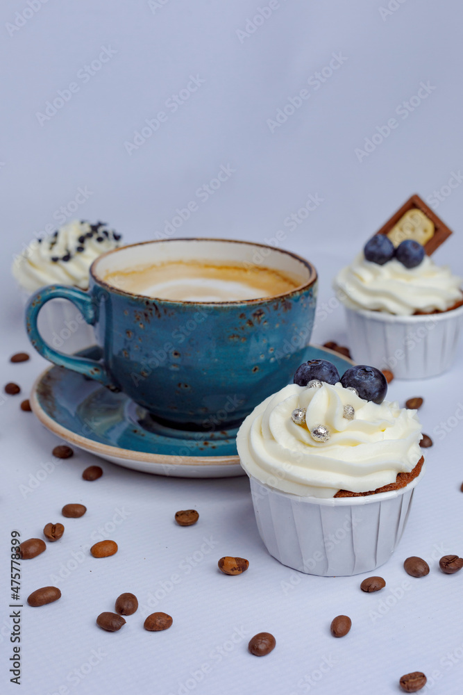 Chocolate cupcakes and coffee on craft paper Chocolate cupcakes and coffee on craft paper