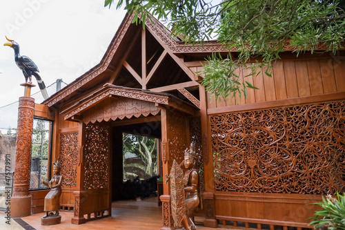 Indonesian Kalimantan Dayak tribe building, carved wood with distinctive patterns and designs