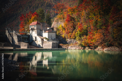 Scenic view of the River Saalach Bad Reichenhall and autumnal forest in Germany photo