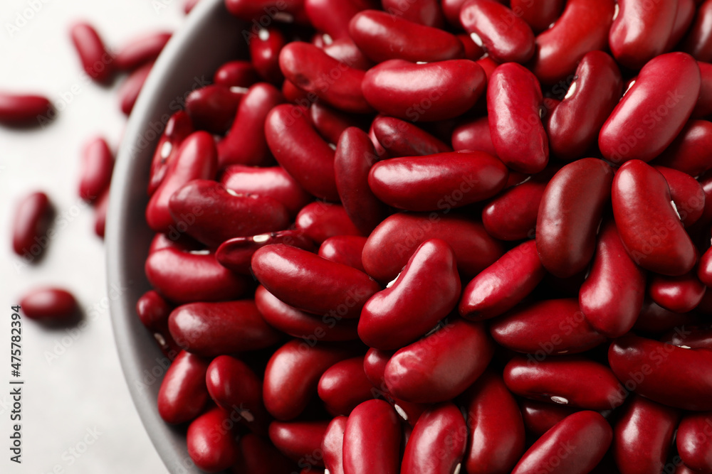 Raw red kidney beans in bowl, top view Raw red kidney beans in bowl, top view