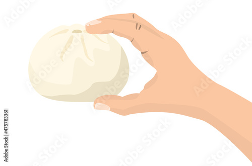 hand holding a bun