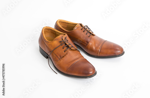Brown leather mens shoes isolated on white background.