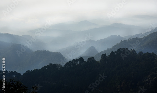 landscape of mountain silhouette layer in the mist