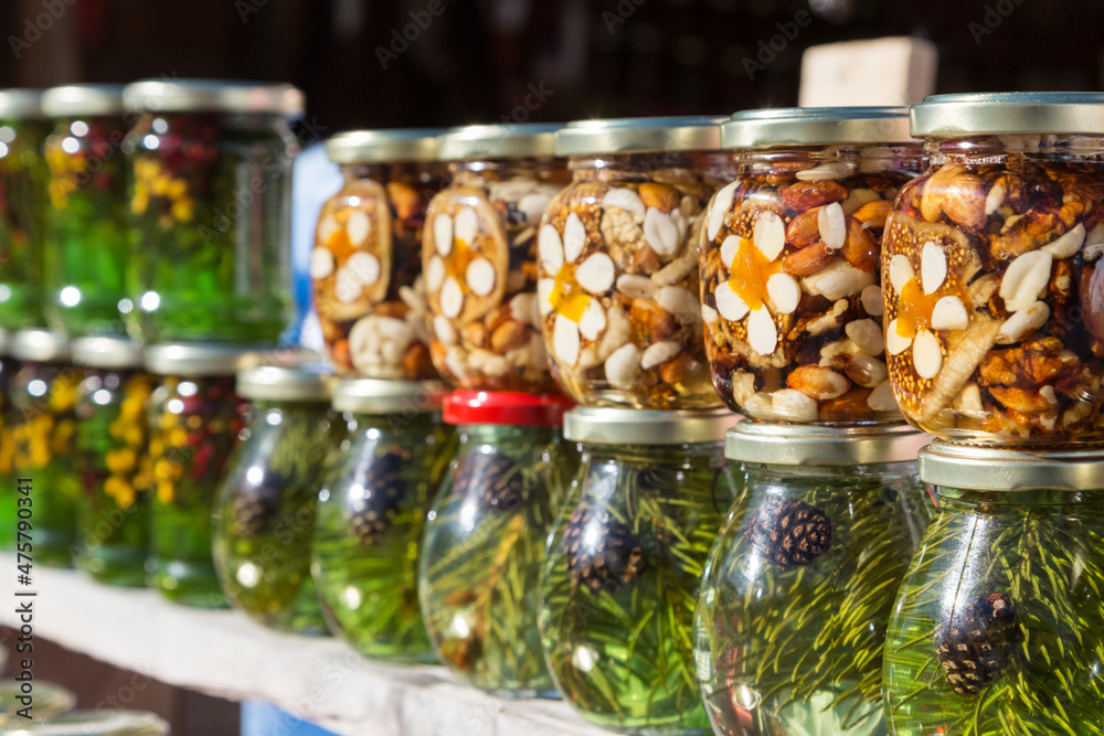 Jars of jam from fir cones and almonds. Jars of jam from fir cones and almonds.
