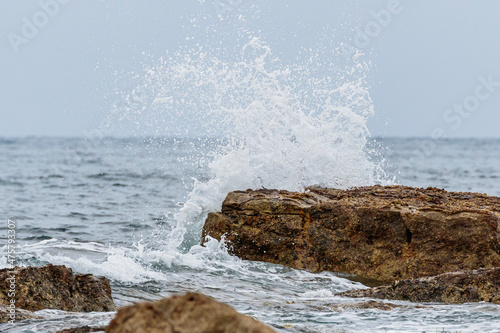 Wave breaking on a rock, Mollymook Beach, NSW, December 2021