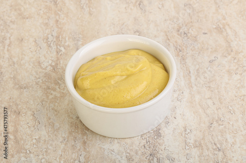 Organic mustard sauce in the bowl