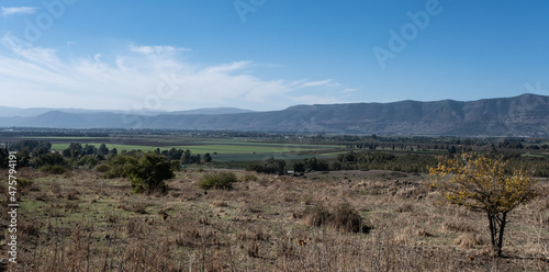 View of Hula Valley and Naftali Mountain Range in the west as seen from Kibbutz Kfar Szold, located at the foot of the Golan Heights in the east, Upper Galilee, Northern Israel, Israel.