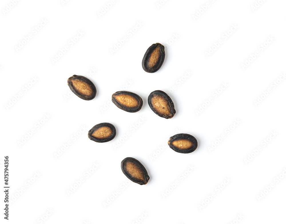 Watermelon seeds on white background. Top view Watermelon seeds on white background. Top view
