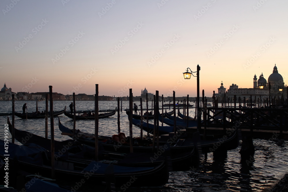 Sunset in San Marco square, Venice, Italy. Venice Grand Canal. Architecture and landmarks. Venice postcard with Venice gondolas