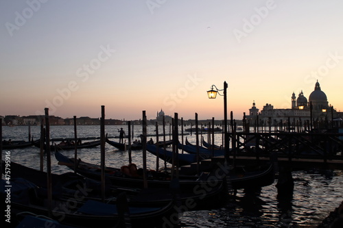 Sunset in San Marco square, Venice, Italy. Venice Grand Canal. Architecture and landmarks. Venice postcard with Venice gondolas © jackdreamhd