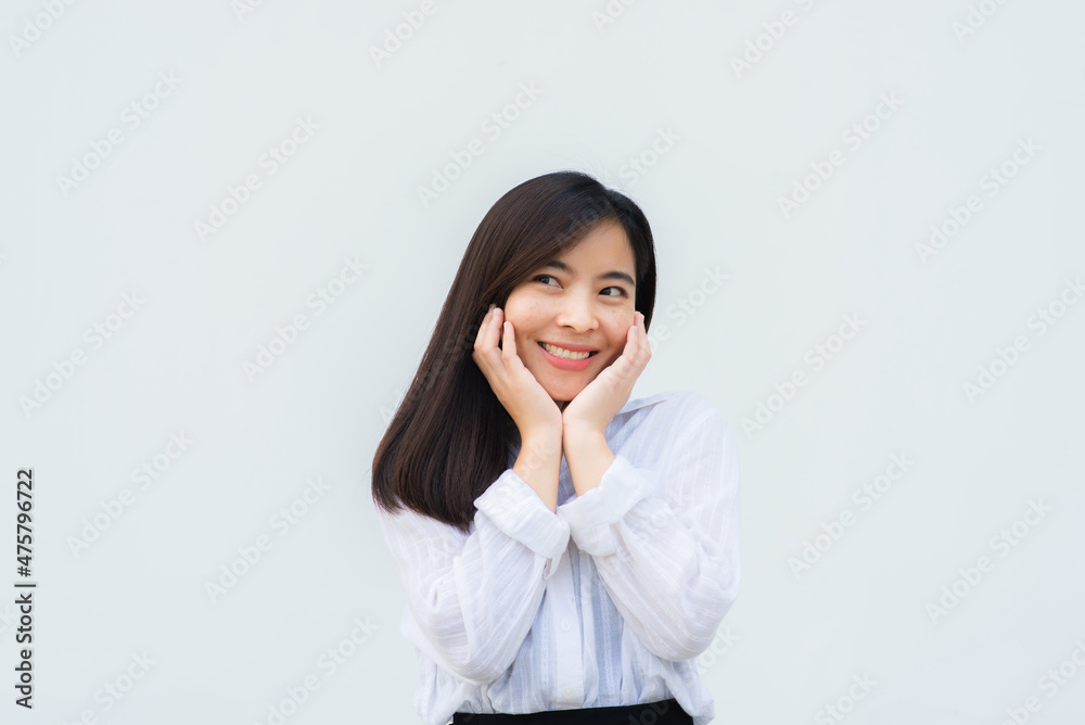close up attractive adult business woman asian girl with happy and smile against white concrete wall office. close up attractive adult business woman asian girl with happy and smile against white concrete wall office.
