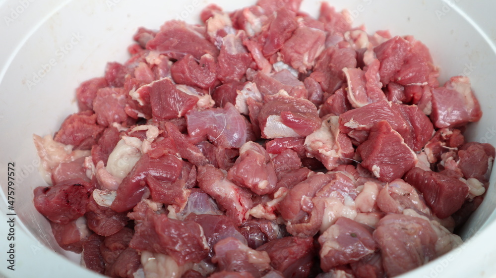 Preparation of cut meat for satay Preparation of cut meat for satay