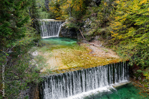 Scenery with waterfalls and cascades on Pisnica river in Kranjska Gora in Slovenia photo