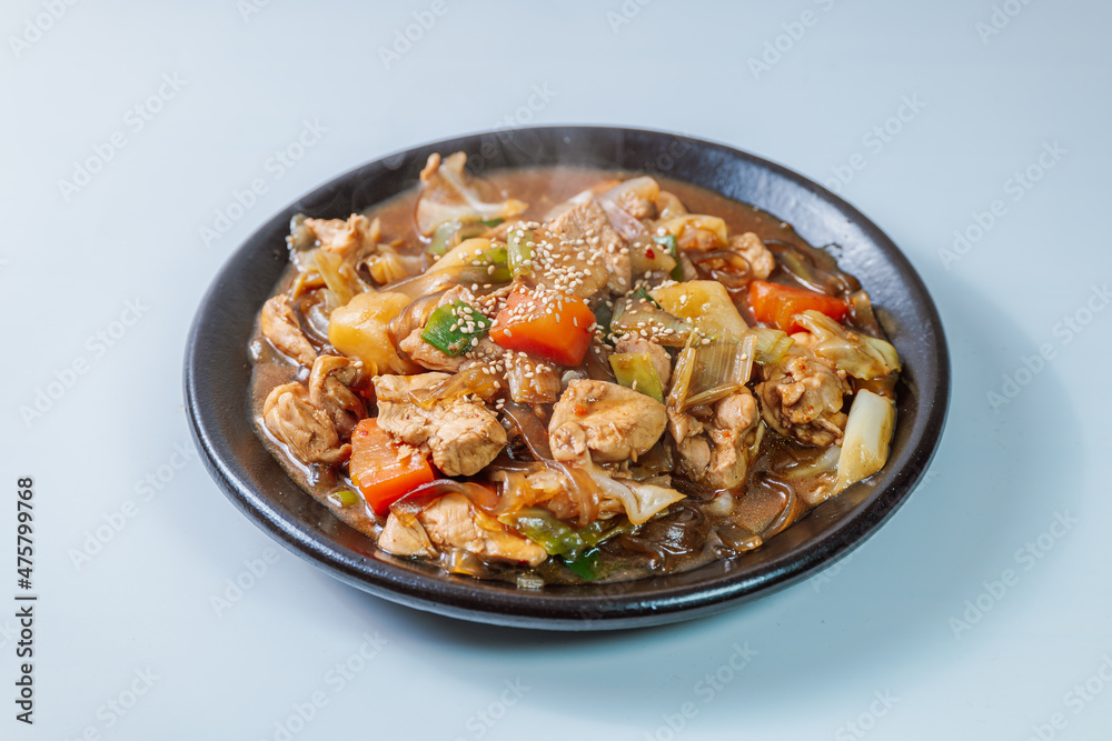 Andongjjimdak, Andong-style spicy stewed chicken : Originally from the Andong region, this dish consists of chicken, chili peppers, potatoes, clear noodles, leeks and carrots braised in a spicy sauce Andongjjimdak, Andong-style spicy stewed chicken : Originally from the Andong region, this dish consists of chicken, chili peppers, potatoes, clear noodles, leeks and carrots braised in a spicy sauce