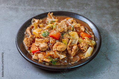 Andongjjimdak, Andong-style spicy stewed chicken : Originally from the Andong region, this dish consists of chicken, chili peppers, potatoes, clear noodles, leeks and carrots braised in a spicy sauce 