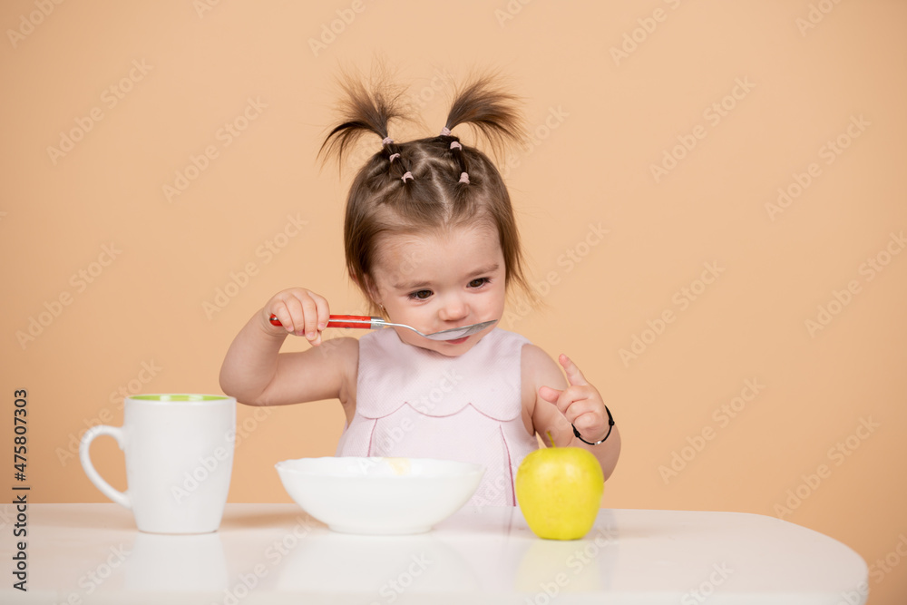 Baby food, babies eating. Healthy nutrition for kids. Funny child face closeup. Baby food, babies eating. Healthy nutrition for kids. Funny child face closeup.